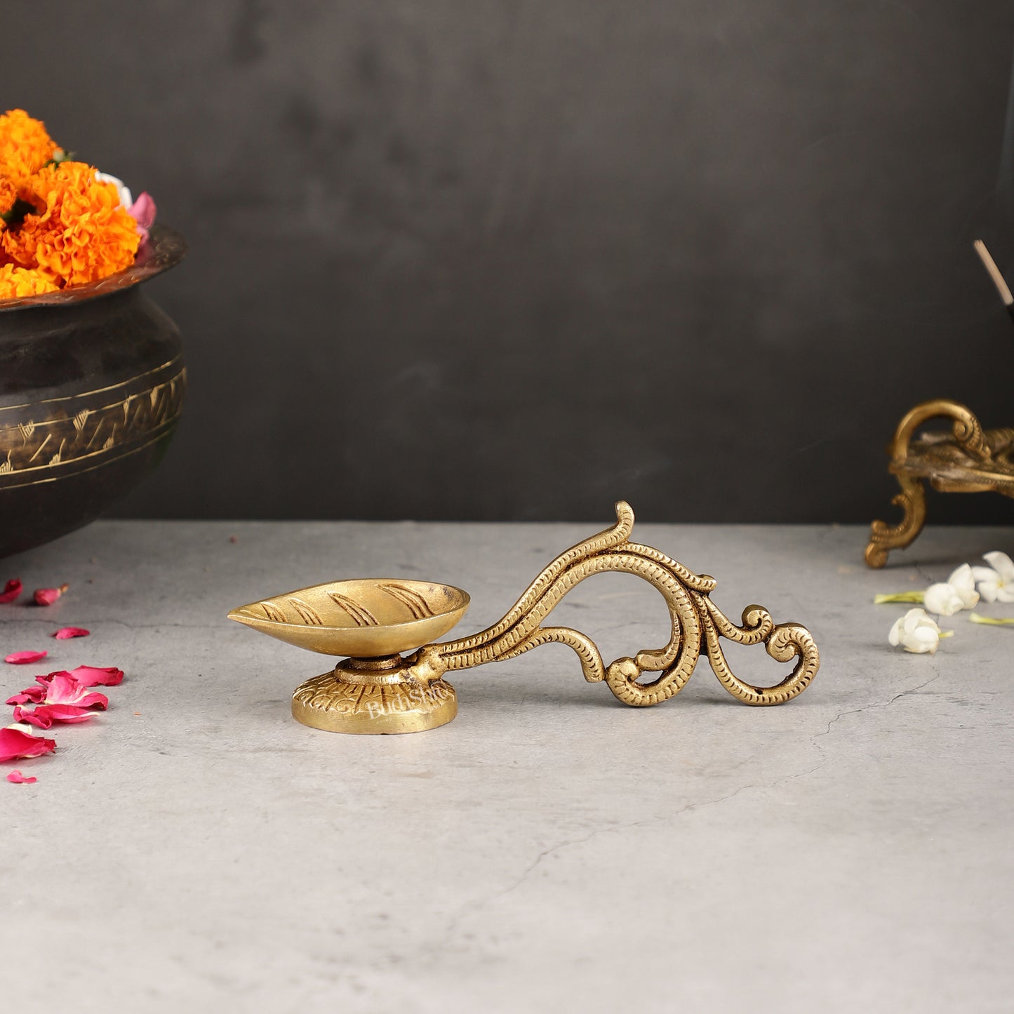 Brass leaf aarti diya with handle