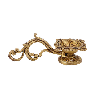 Brass unique diya with handle