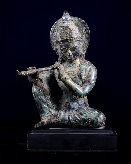 Balinese Bronze Krishna Playing the Flute – Seated on Wooden Base 6.7 inch - Budhshiv.com