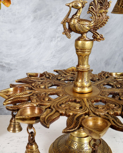 Brass Annam Pakshi Peacock Oil Lamp – 7 Wick Diya with Hanging Bells (13.4 Inches) - Budhshiv.com