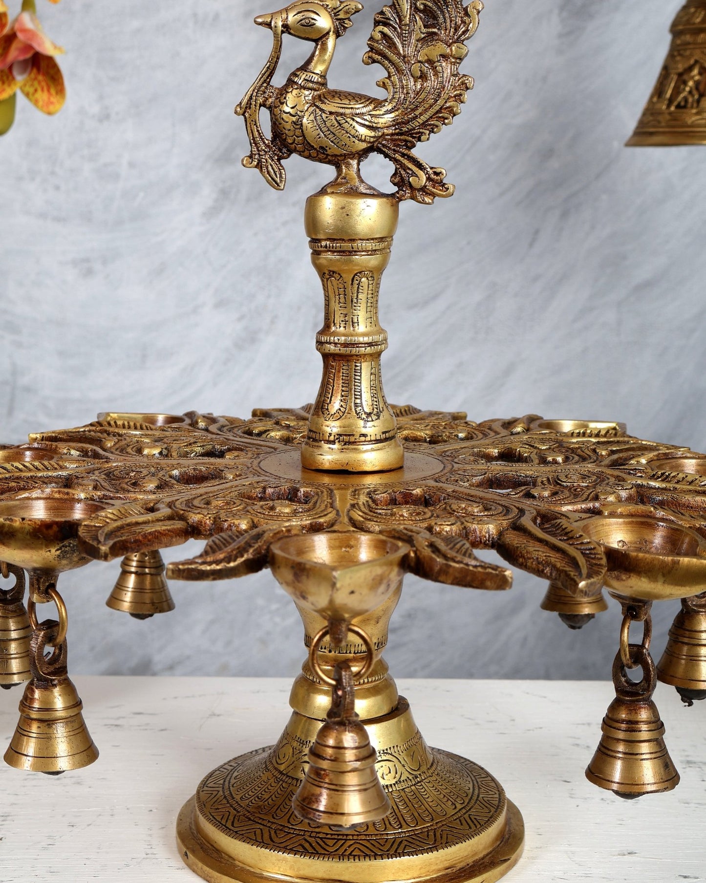 Brass Annam Pakshi Peacock Oil Lamp – 7 Wick Diya with Hanging Bells (13.4 Inches) - Budhshiv.com