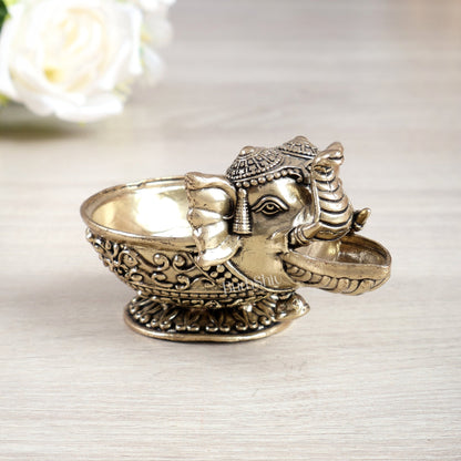 Brass Elephant Face Diya Oil Lamp Vilakku – Small Handcrafted Pooja Lamp (2 Inches) - Budhshiv.com