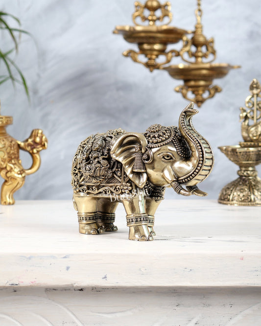 Brass Elephant Showpiece Trunk Up with Ganesha Lakshmi Carvings | Auspicious Décor Figurine 6" wide - Budhshiv.com