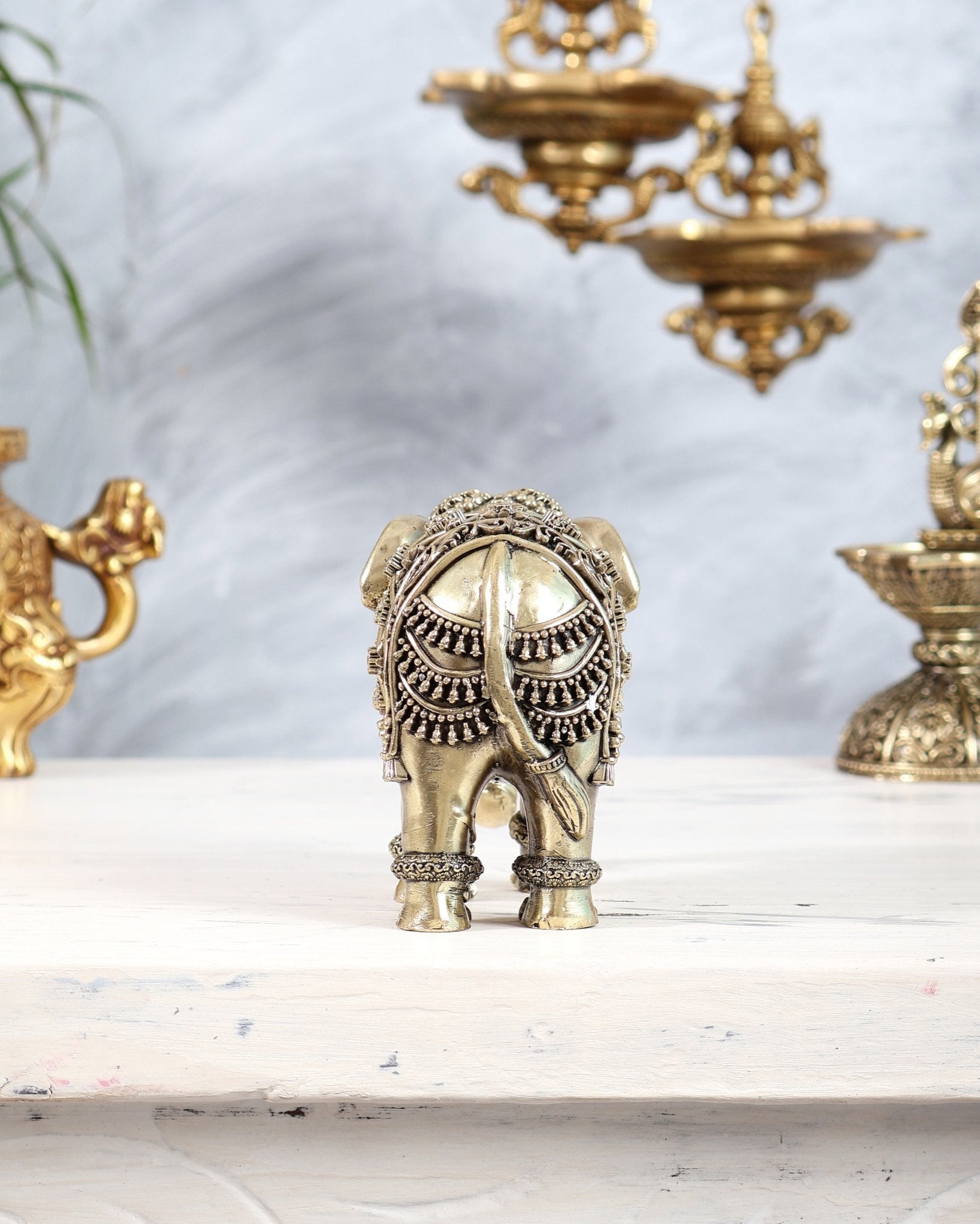 Brass Elephant Showpiece with Trunk Down | Superfine Decorative Elephant Figurine 5 inch wide - Budhshiv.com
