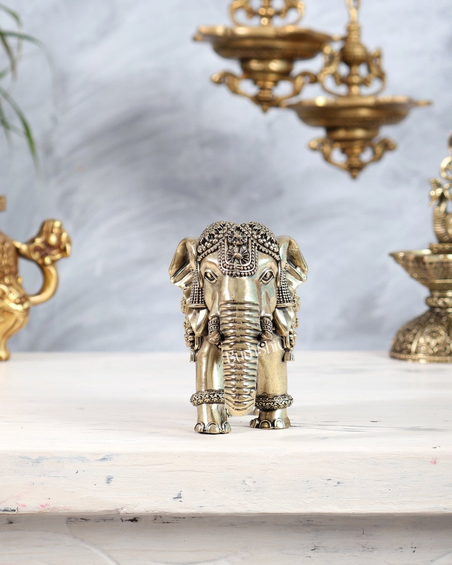 Brass Elephant Showpiece with Trunk Down | Superfine Decorative Elephant Figurine 5 inch wide - Budhshiv.com