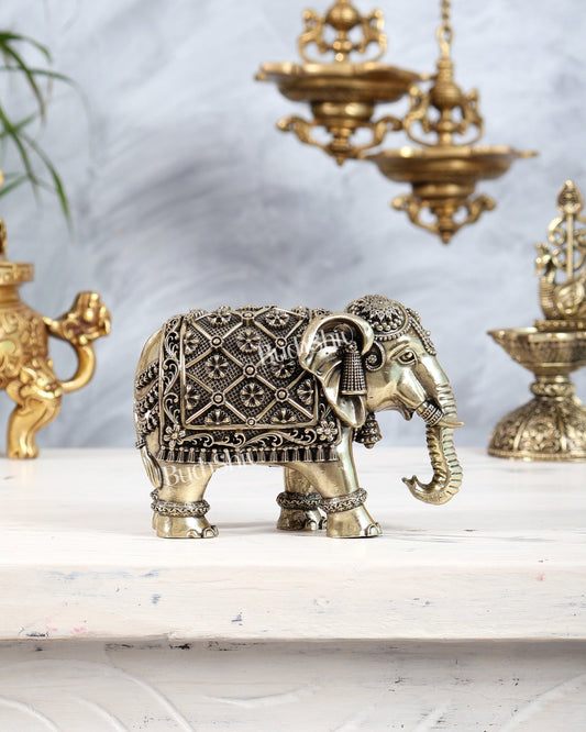 Brass Elephant Showpiece with Trunk Down | Superfine Decorative Elephant Figurine 5 inch wide - Budhshiv.com
