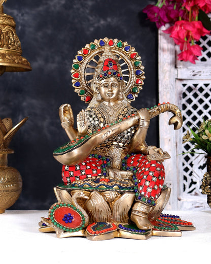 Brass Goddess Saraswati Sitting on Lotus with Swan | 11 Inch with meenakari Stonework - Budhshiv.com