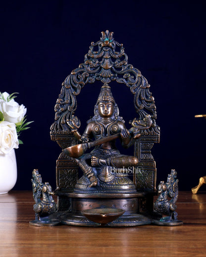 Brass Goddess Saraswati with attached diya and Prabhavali idol - Budhshiv.com