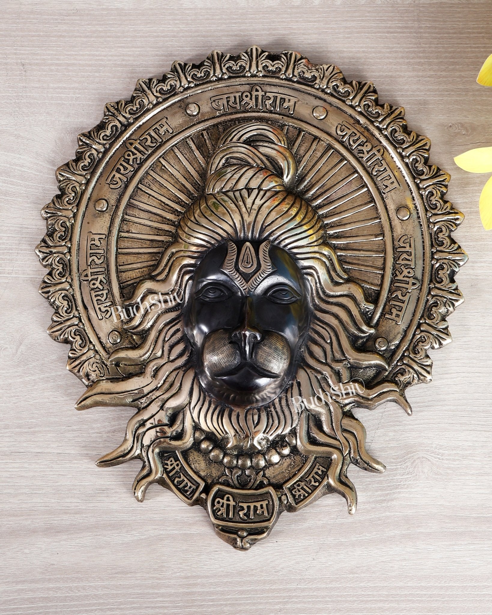 Brass Hanuman Face Wall Hanging with Jai Shri Ram Carvings | 12" black and gold - Budhshiv.com