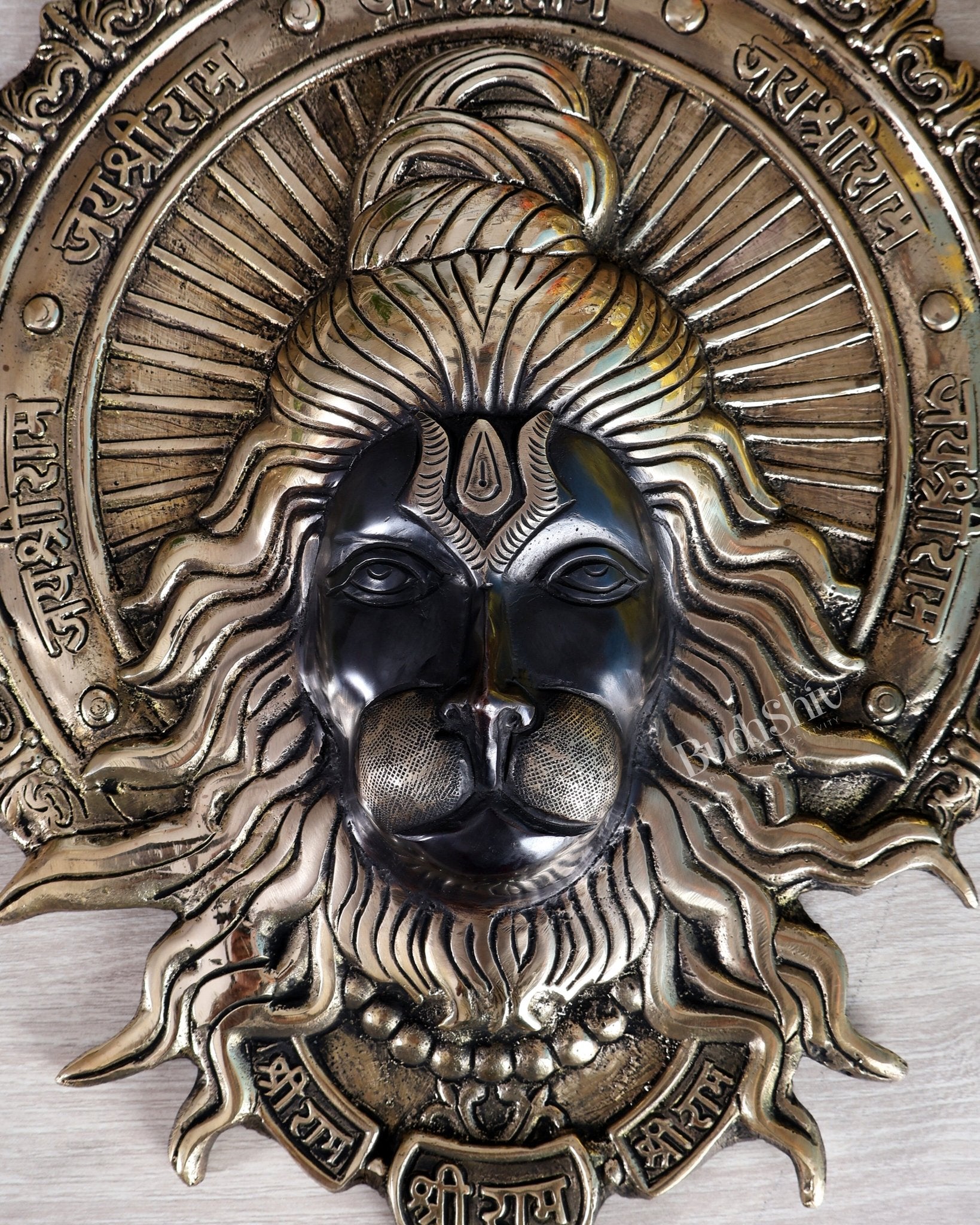 Brass Hanuman Face Wall Hanging with Jai Shri Ram Carvings | 12" black and gold - Budhshiv.com