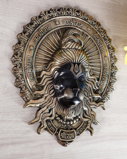 Brass Hanuman Face Wall Hanging with Jai Shri Ram Carvings | 12" black and gold - Budhshiv.com