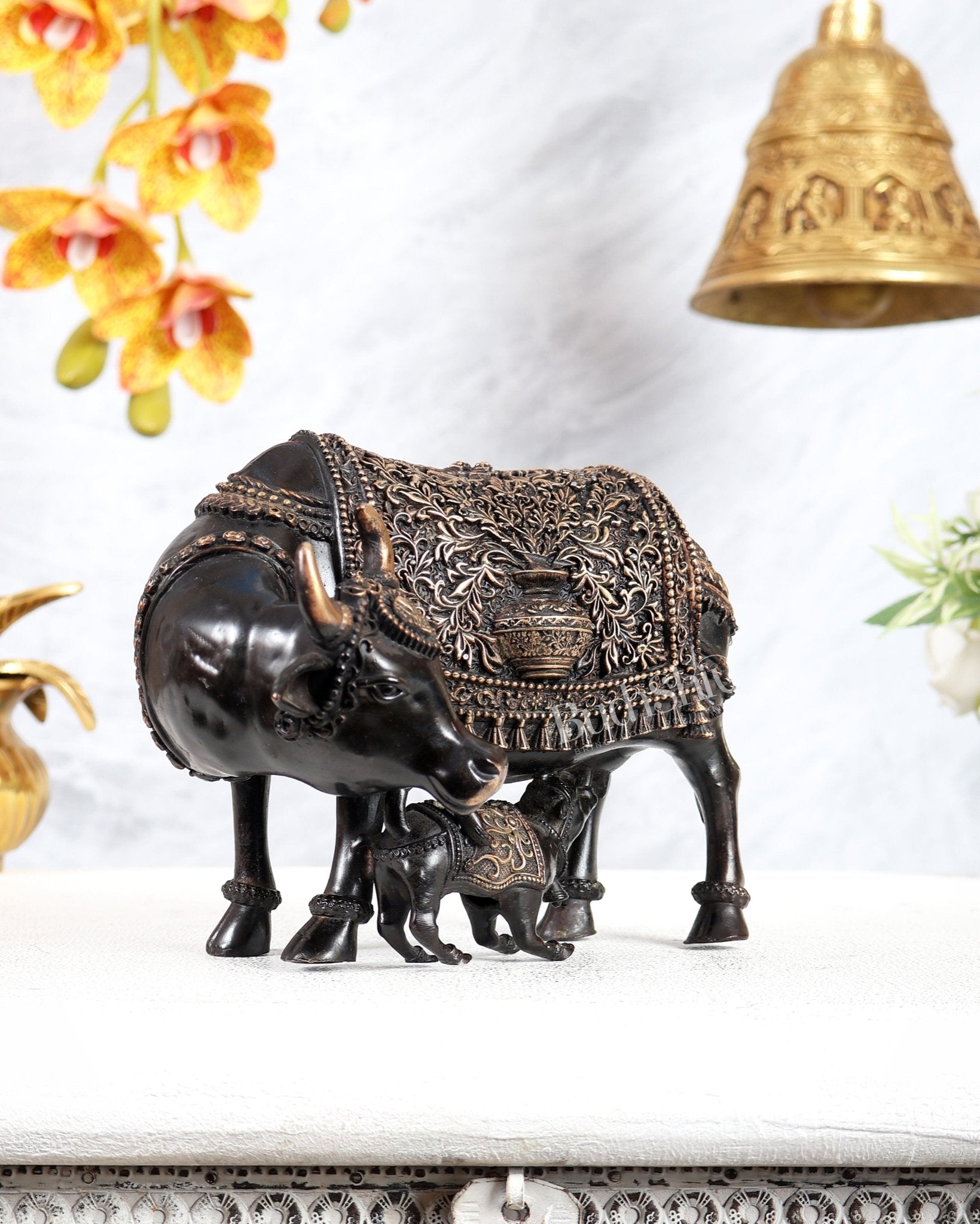 Brass Kamdhenu Cow with Calf Idol | Auspicious Cow & Calf Statue with Kalash Carvings 6.5" black finish - Budhshiv.com