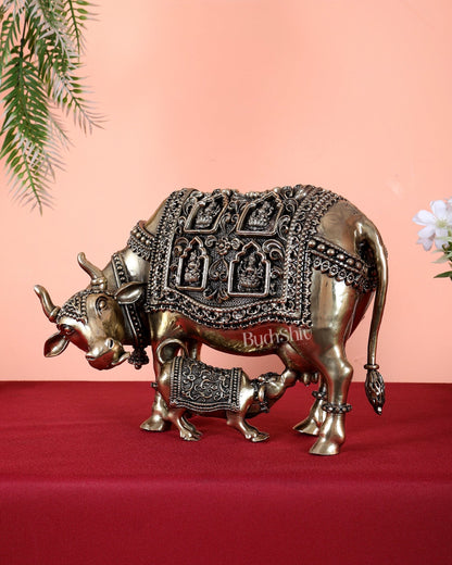Brass Kamdhenu Cow with Calf with ashtalakshmi carvings 9" - Budhshiv.com