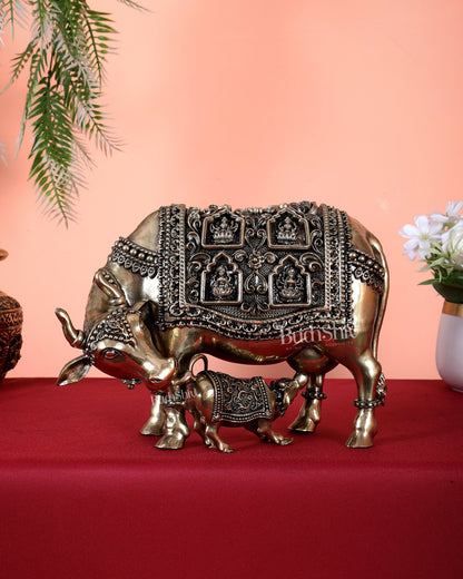 Brass Kamdhenu Cow with Calf with ashtalakshmi carvings 9" - Budhshiv.com