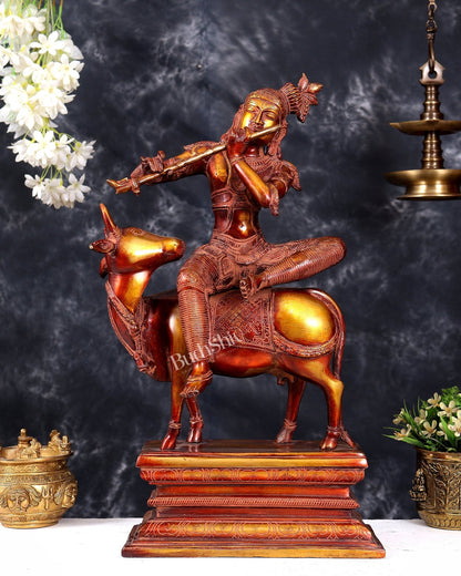 Brass Krishna sitting on Cow Statue| 21 inch fiery red finish - Budhshiv.com