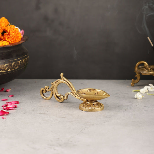 Brass leaf aarti diya with handle - Budhshiv.com
