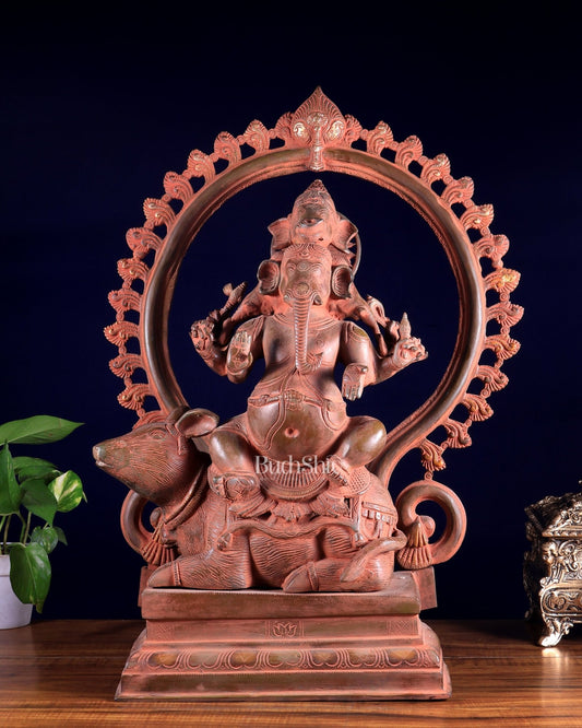 Brass Lord Ganesha Seated on Mooshak with Prabhavali – Red Sand Patina 24 inch - Budhshiv.com