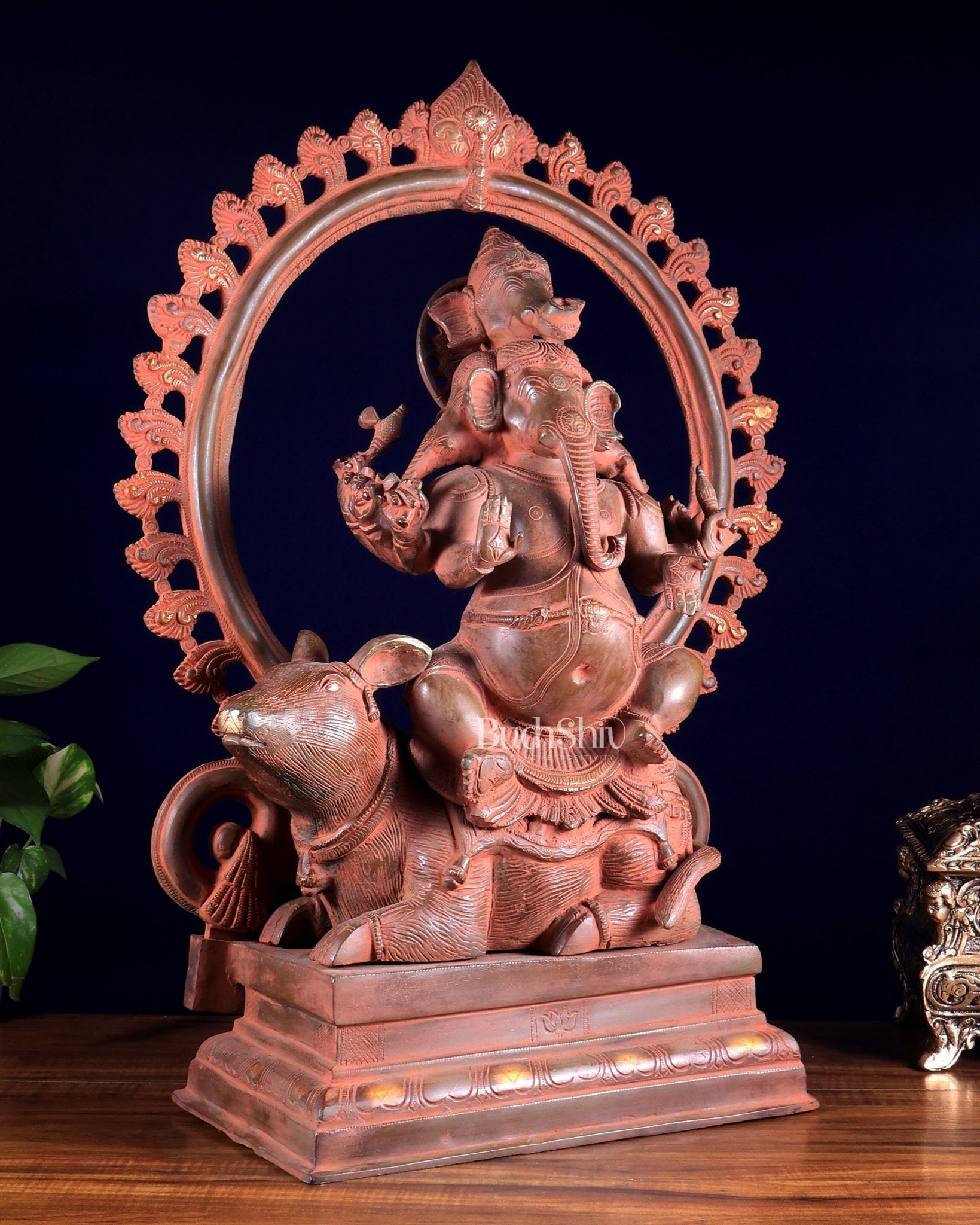 Brass Lord Ganesha Seated on Mooshak with Prabhavali – Red Sand Patina 24 inch - Budhshiv.com