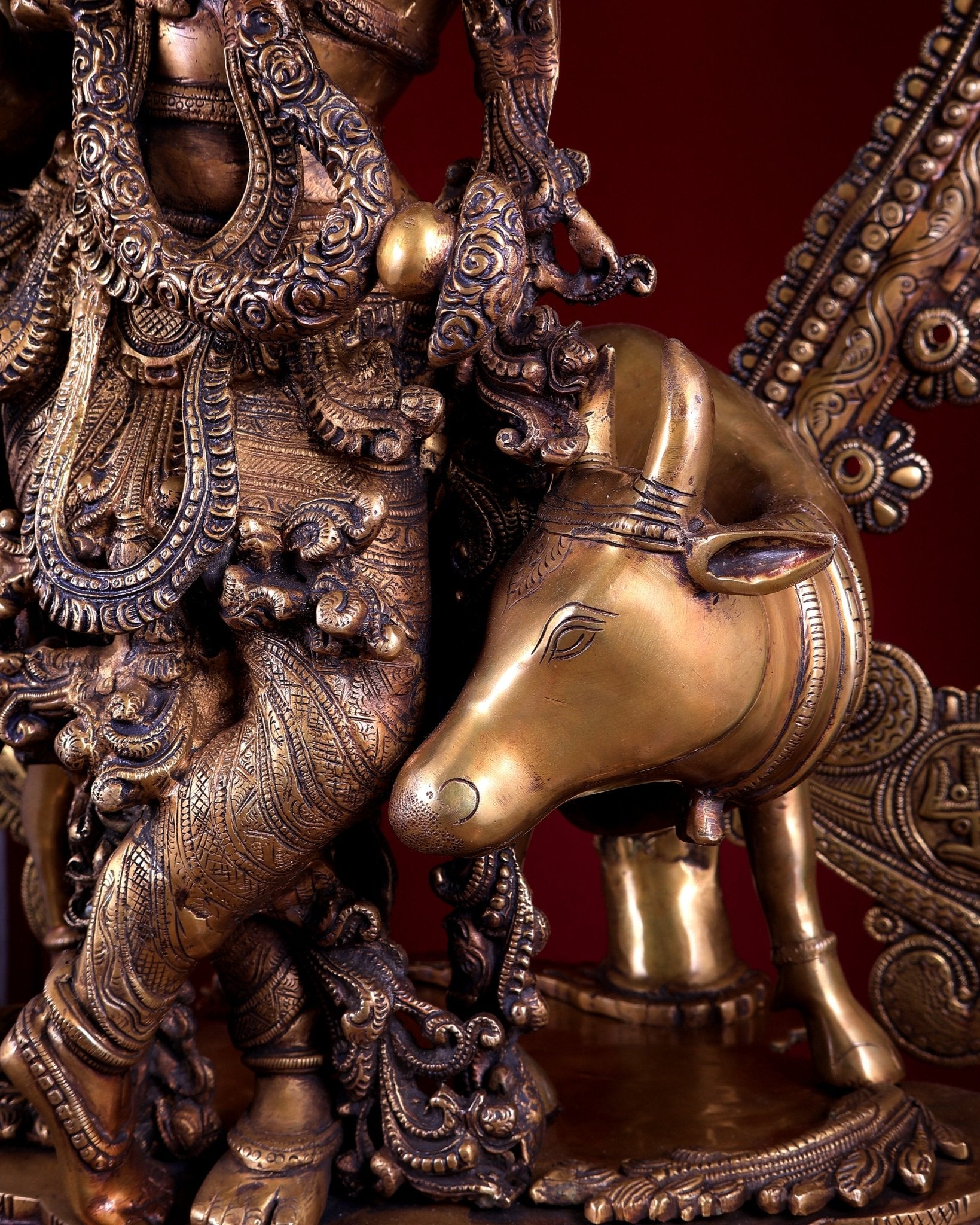 Brass Lord Krishna with Cow on Grand Kirtimukha Pedestal with Twin Peacock Lamps 37.6 inch - Budhshiv.com