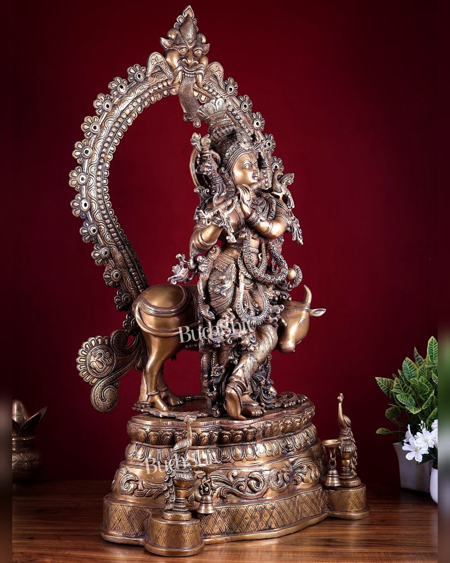 Brass Lord Krishna with Cow on Grand Kirtimukha Pedestal with Twin Peacock Lamps 37.6 inch - Budhshiv.com