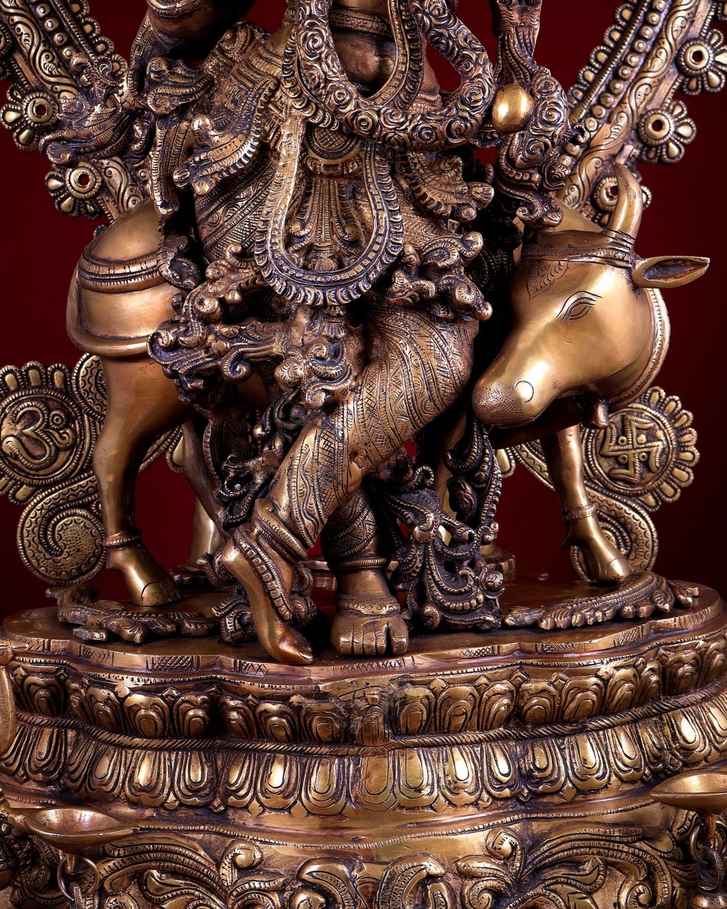 Brass Lord Krishna with Cow on Grand Kirtimukha Pedestal with Twin Peacock Lamps 37.6 inch - Budhshiv.com