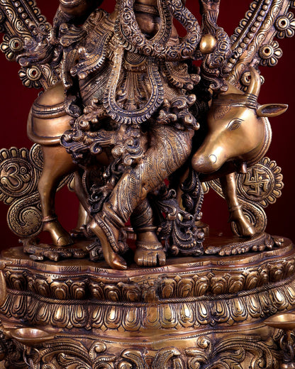 Brass Lord Krishna with Cow on Grand Kirtimukha Pedestal with Twin Peacock Lamps 37.6 inch - Budhshiv.com