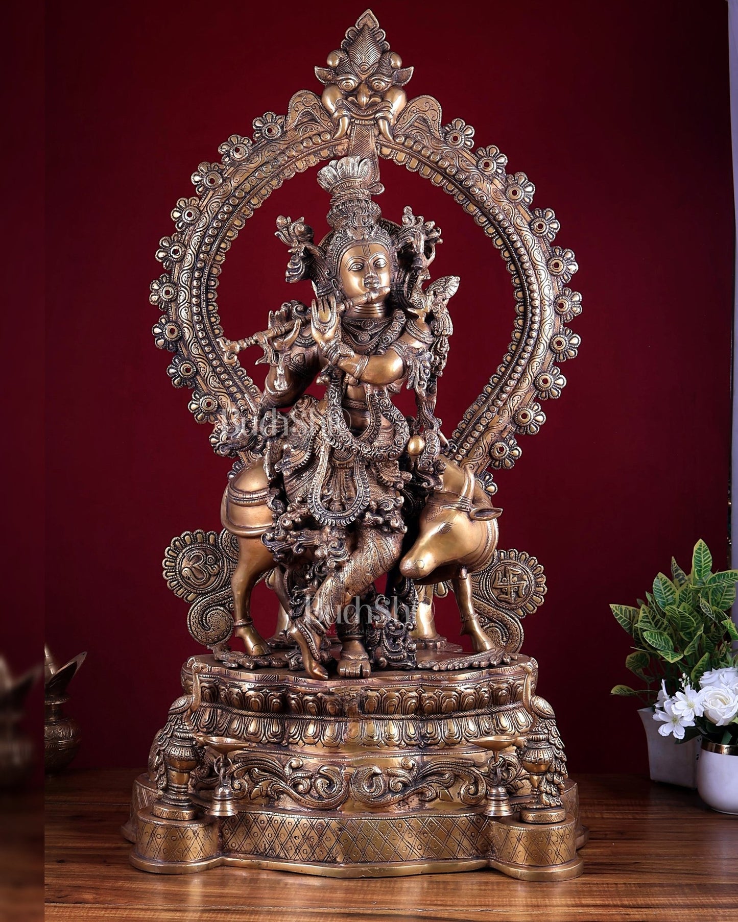 Brass Lord Krishna with Cow on Grand Kirtimukha Pedestal with Twin Peacock Lamps 37.6 inch - Budhshiv.com