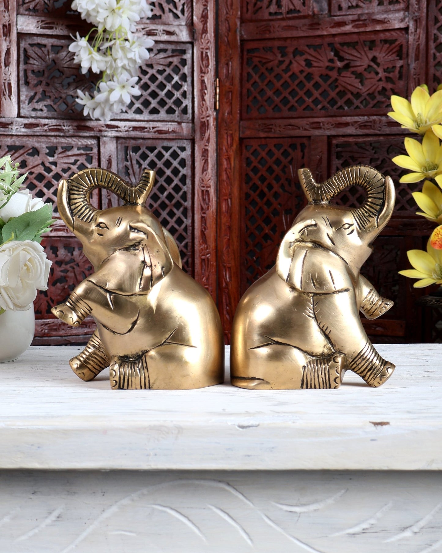 Brass Pair of Baby Elephants with Raised Trunks | Auspicious Elephant Showpiece for Home Décor - Budhshiv.com