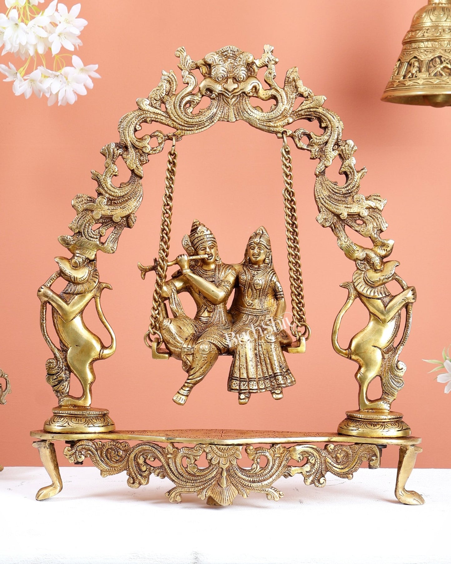 Brass Radha Krishna on Kirtimukha Prabhavali Swing – Divine Jhula Statue (18 Inches) - Budhshiv.com