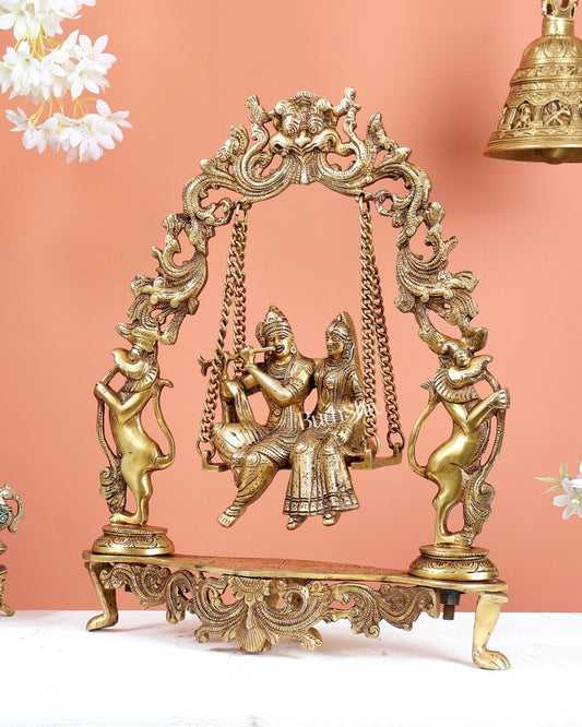 Brass Radha Krishna on Kirtimukha Prabhavali Swing – Divine Jhula Statue (18 Inches) - Budhshiv.com