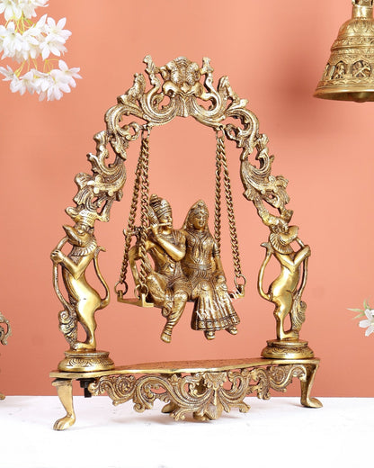 Brass Radha Krishna on Kirtimukha Prabhavali Swing – Divine Jhula Statue (18 Inches) - Budhshiv.com