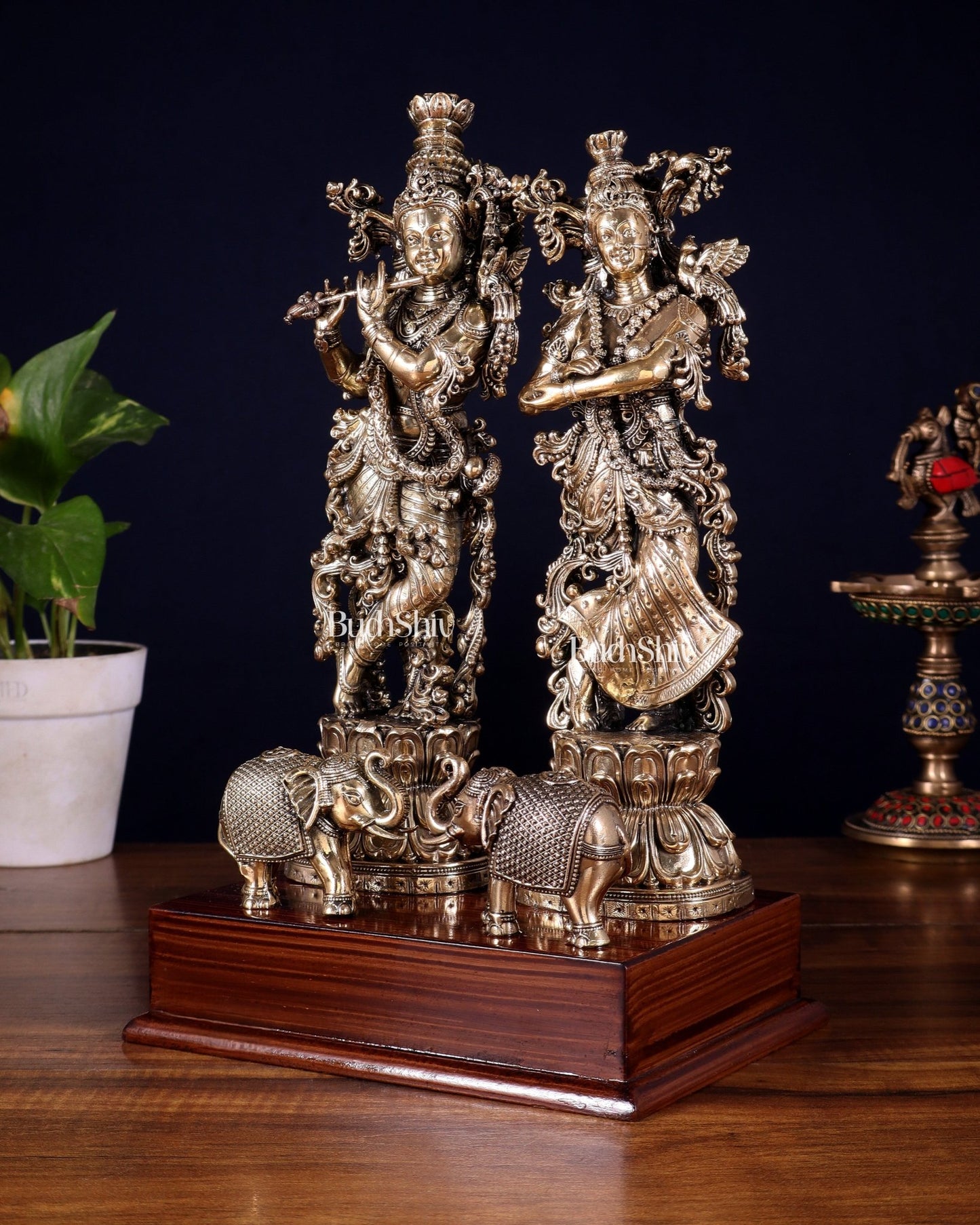 Brass Radha Krishna with Elephants on Wooden Base – Superfine Finish 11.5 inch - Budhshiv.com