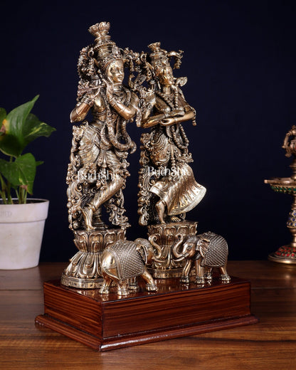 Brass Radha Krishna with Elephants on Wooden Base – Superfine Finish 11.5 inch - Budhshiv.com