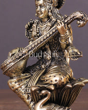 Brass Saraswati Idol Seated on Lotus 4 inch - Budhshiv.com