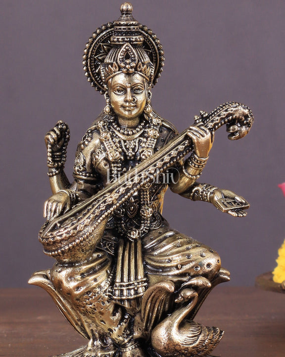 Brass Saraswati Idol Seated on Lotus 4 inch - Budhshiv.com