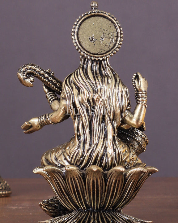 Brass Saraswati Idol Seated on Lotus 4 inch - Budhshiv.com