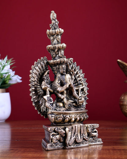 Brass Seated Avalokiteshvara with Many Heads and Hands 9 inch - Budhshiv.com