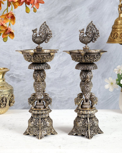 Brass Superfine Annam Pakshi Samai Diya – Elephant & Peacock Carvings Traditional Lamp (12 Inches) pair - Budhshiv.com
