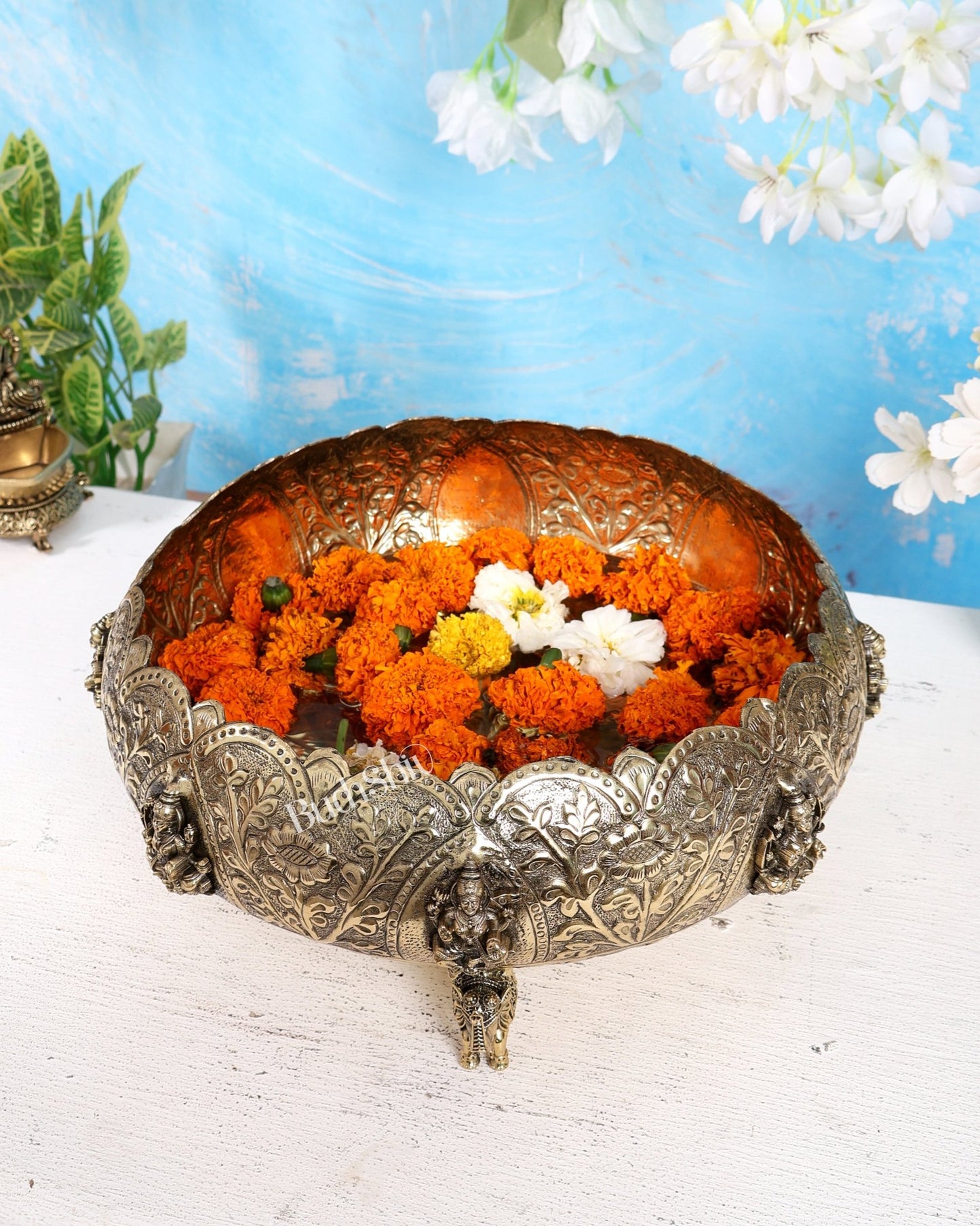 Brass Superfine Ashtalakshmi Urli with Elephant Legs – 10 Inch Decorative Bowl - Budhshiv.com