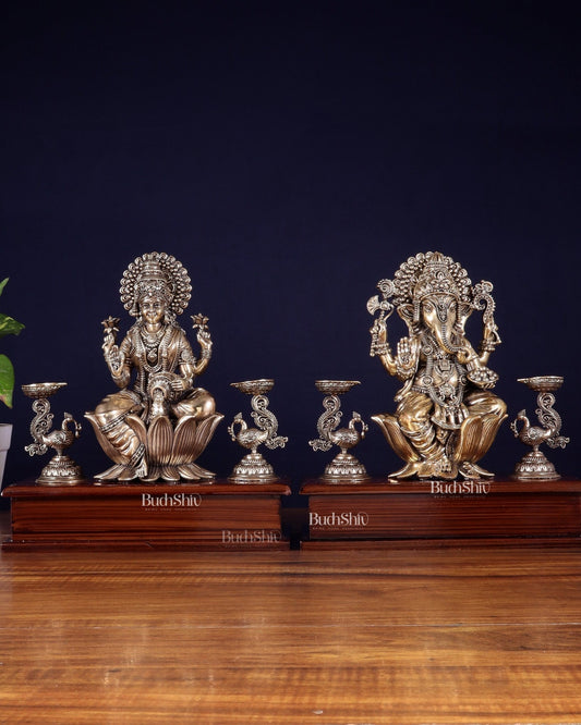 Brass Superfine Ganesh–Lakshmi Pair with Twin Peacock Lamps on Wooden Base – 9.5 Inch - Budhshiv.com