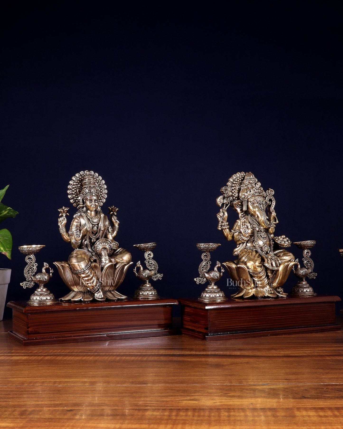 Brass Superfine Ganesh–Lakshmi Pair with Twin Peacock Lamps on Wooden Base – 9.5 Inch - Budhshiv.com