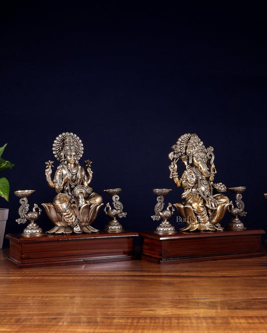 Brass Superfine Ganesh–Lakshmi Pair with Twin Peacock Lamps on Wooden Base – 9.5 Inch - Budhshiv.com
