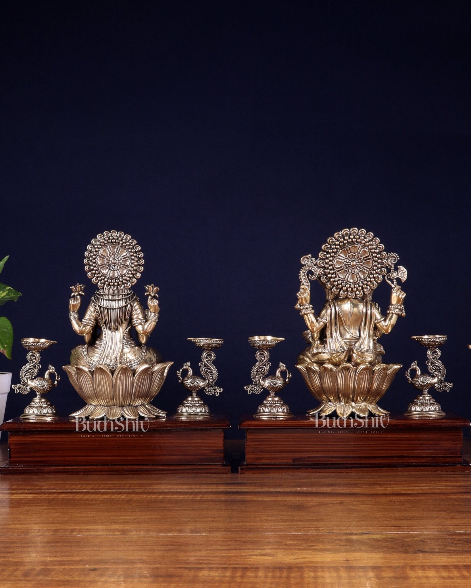 Brass Superfine Ganesh–Lakshmi Pair with Twin Peacock Lamps on Wooden Base – 9.5 Inch - Budhshiv.com