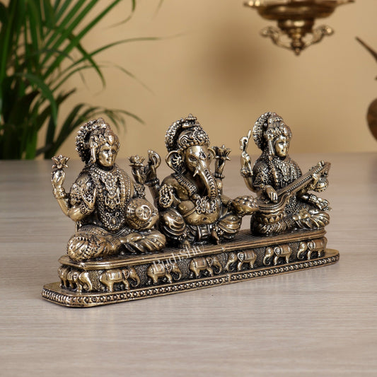 Brass Superfine Ganesh Lakshmi Saraswati Idol on Same Base – 3 inch tall 6.5 Inch wide Divine Trio - Budhshiv.com