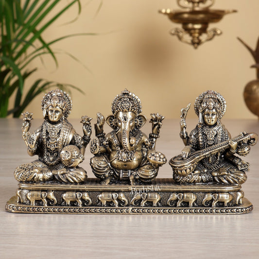 Brass Superfine Ganesh Lakshmi Saraswati Idol on Same Base – 3 inch tall 6.5 Inch wide Divine Trio - Budhshiv.com