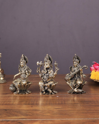 Brass Superfine Ganesha, Lakshmi, and Saraswati Idols Seated on Lotus 4" - Budhshiv.com
