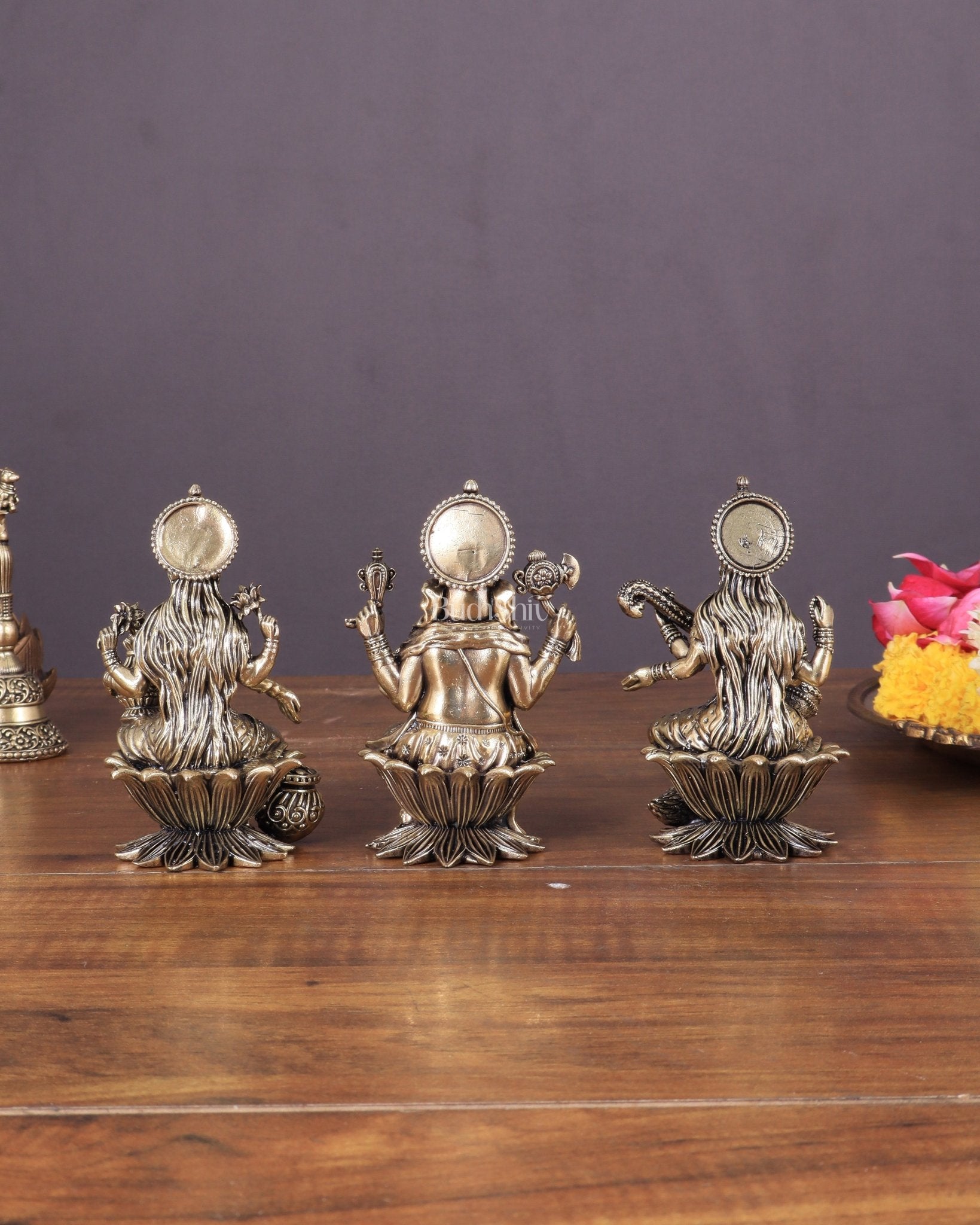 Brass Superfine Ganesha, Lakshmi, and Saraswati Idols Seated on Lotus 4" - Budhshiv.com