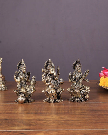 Brass Superfine Ganesha, Lakshmi, and Saraswati Idols Seated on Lotus 4" - Budhshiv.com