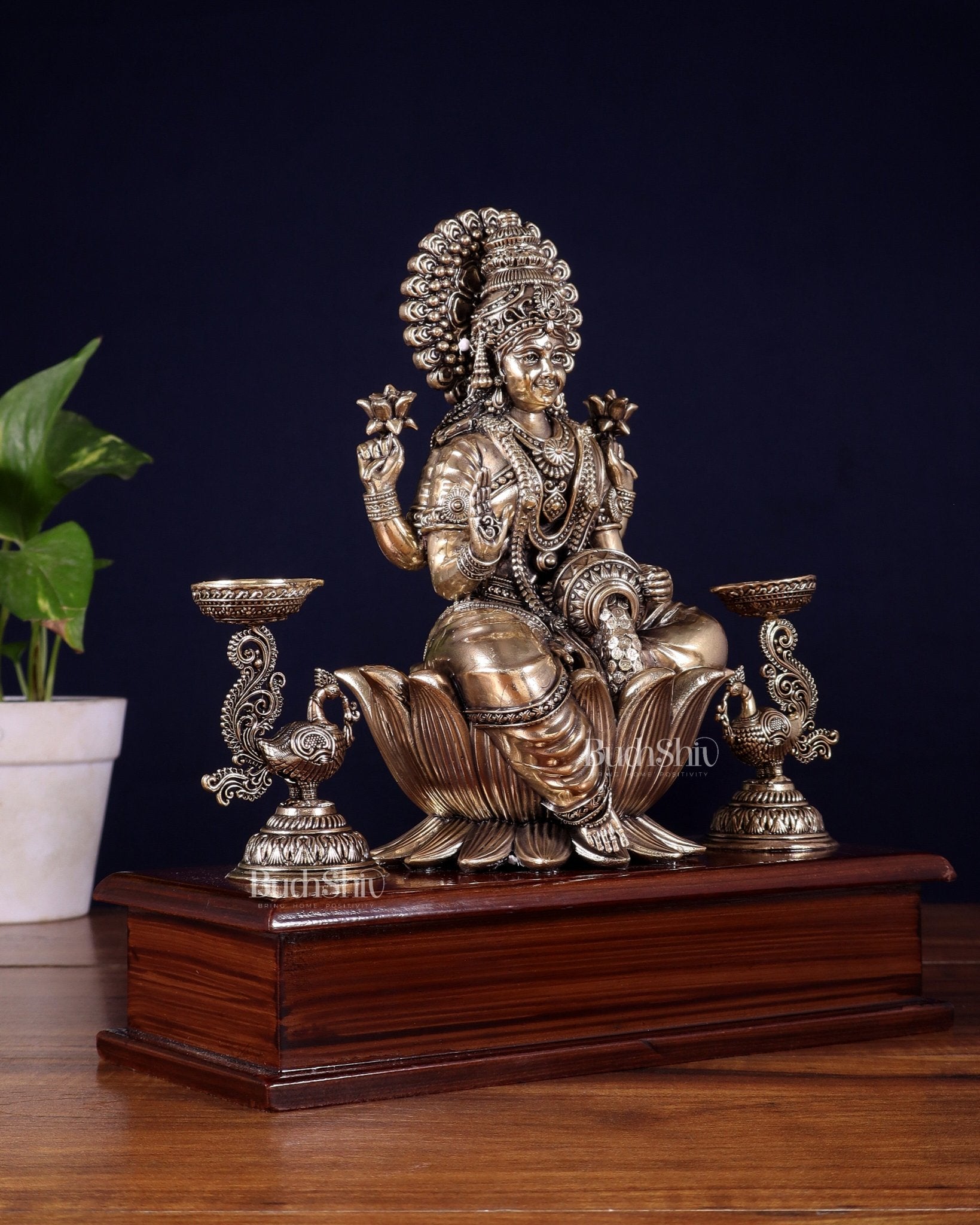 Brass Superfine Goddess Lakshmi Idol with Twin Peacock Lamps on Wooden Base – 9.5 Inch - Budhshiv.com