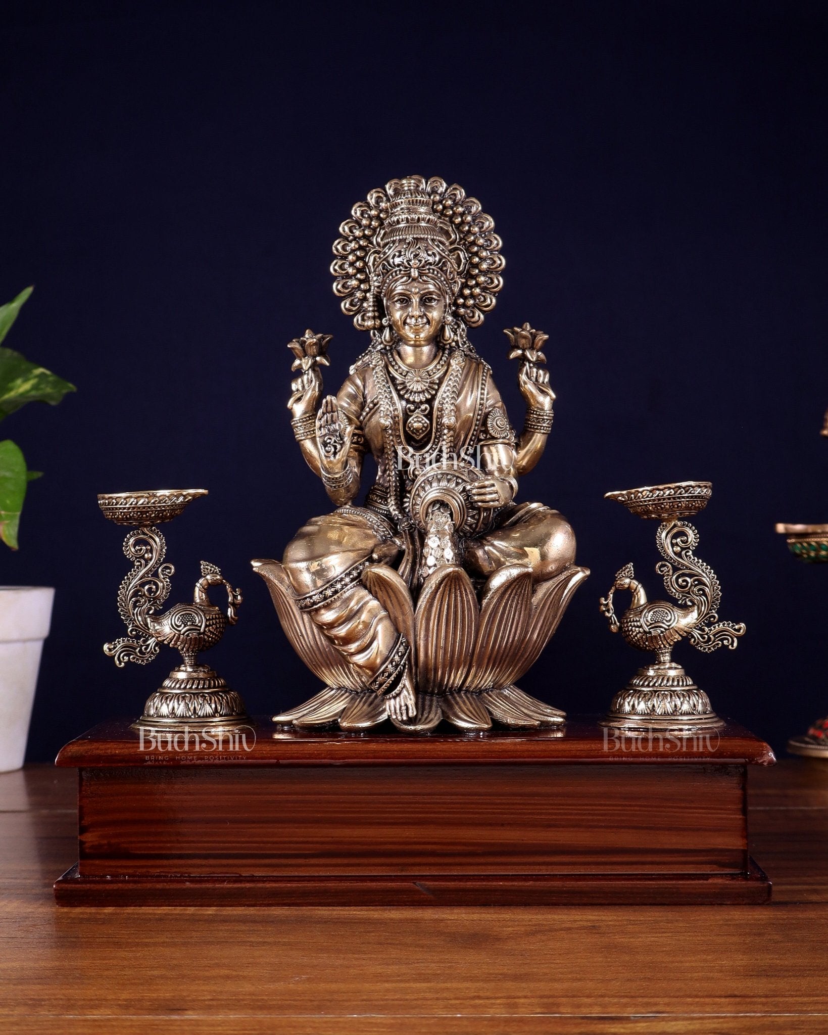 Brass Superfine Goddess Lakshmi Idol with Twin Peacock Lamps on Wooden Base – 9.5 Inch - Budhshiv.com
